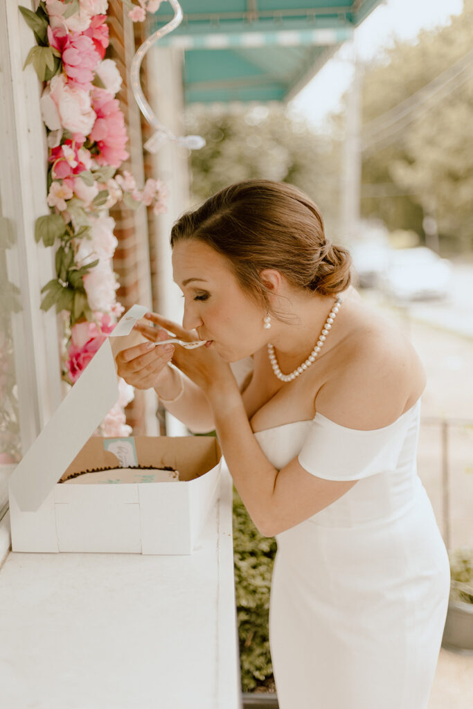 bride eating her wedding cake 