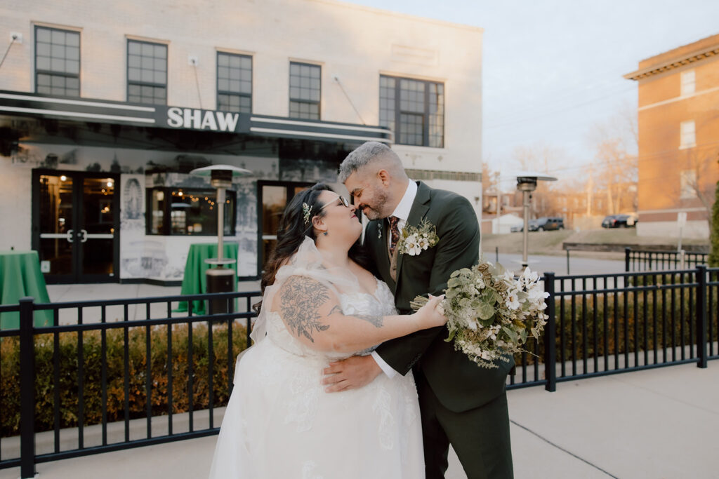 Couple standing at the wild carrot venue in stl