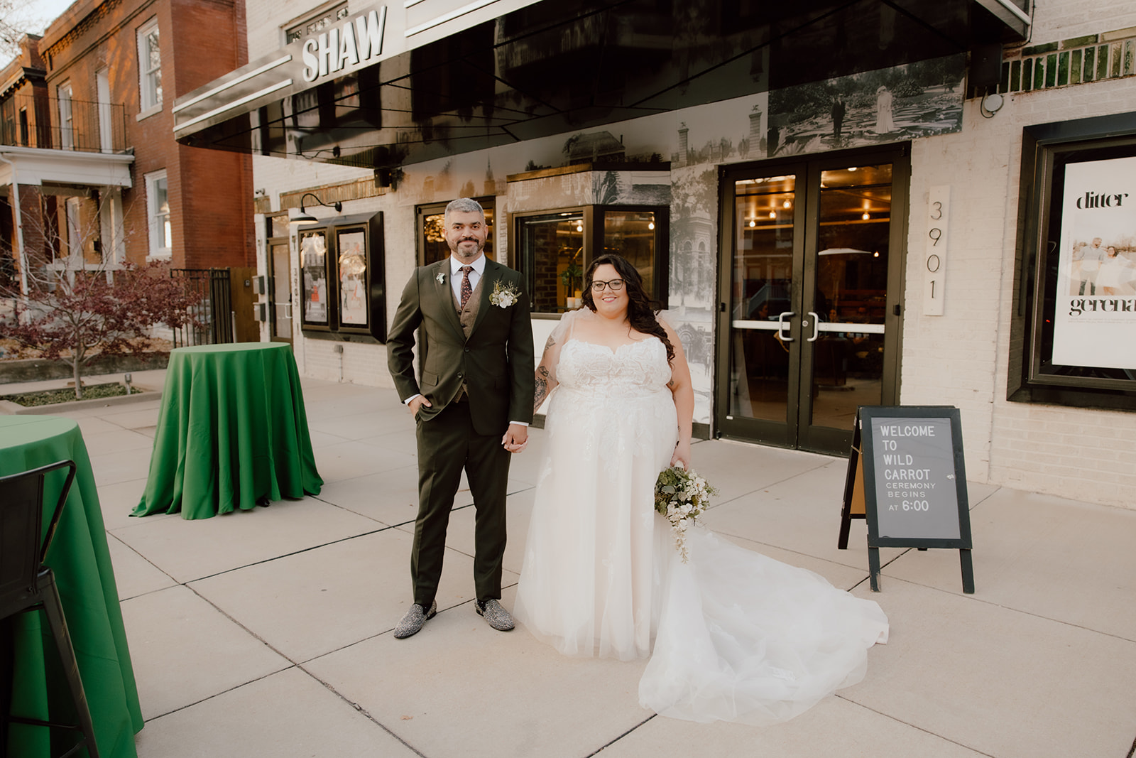 Couple standing holding hands at wild carrot stl 