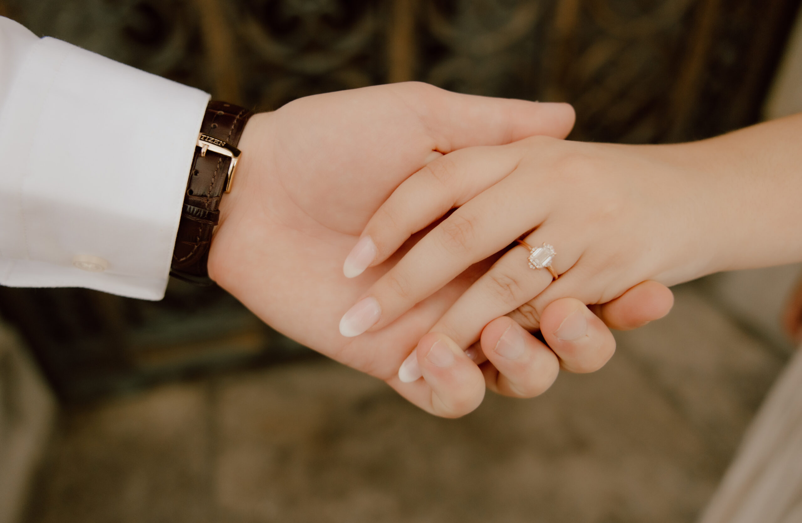 couple holding hands together at the St Louis Public Library 