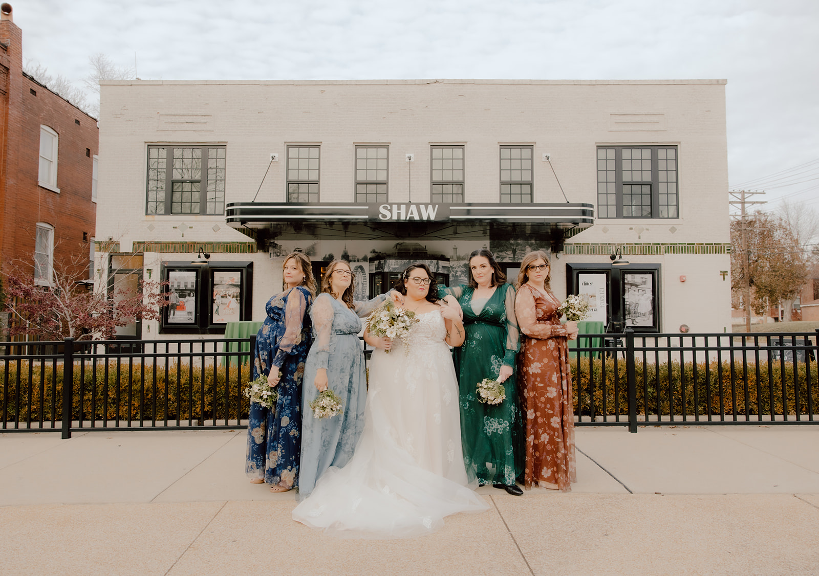 bridesmaids standing outside a wedding venue in st louis 