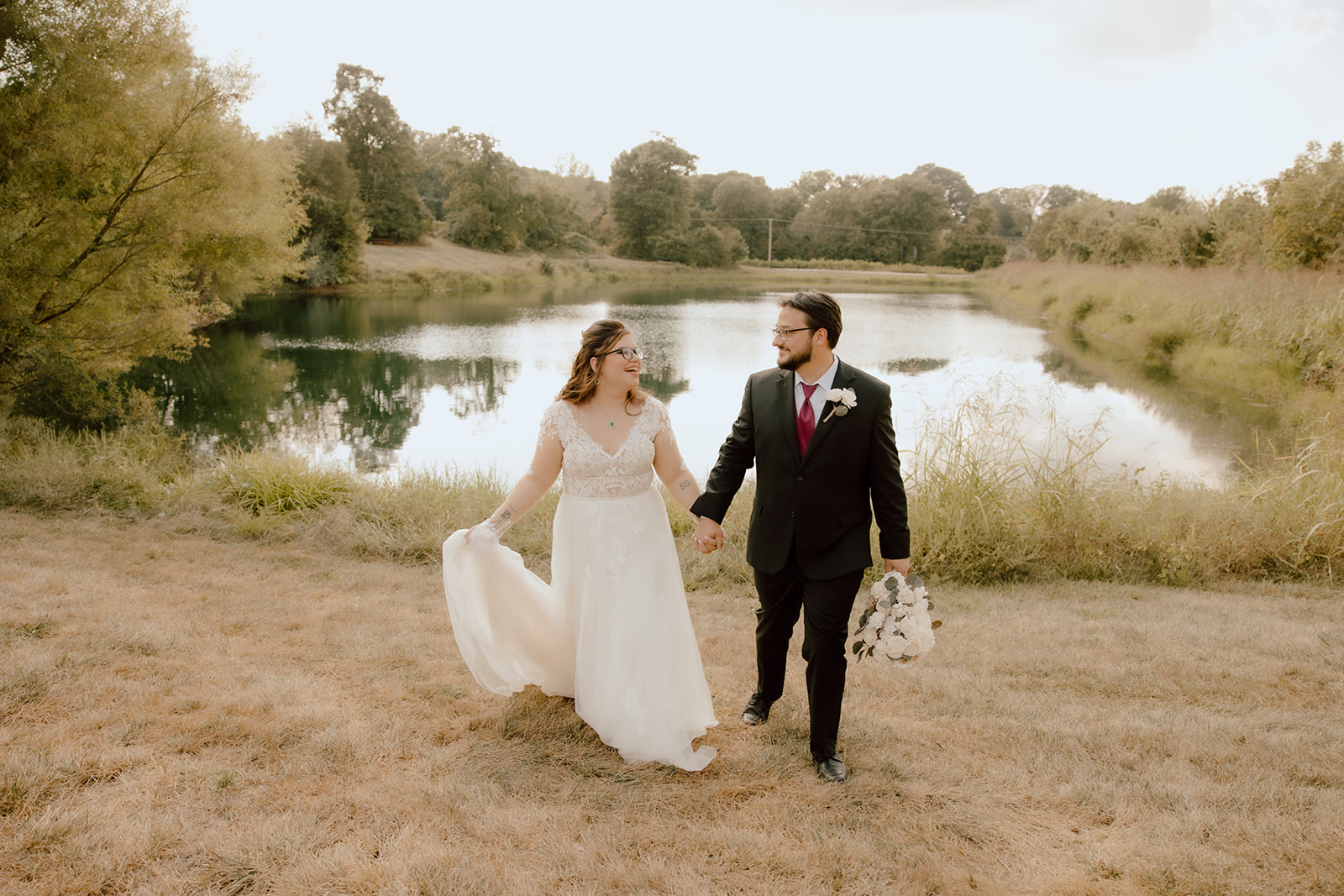 Couple holding hands at a Missouri Winery in St Louis 